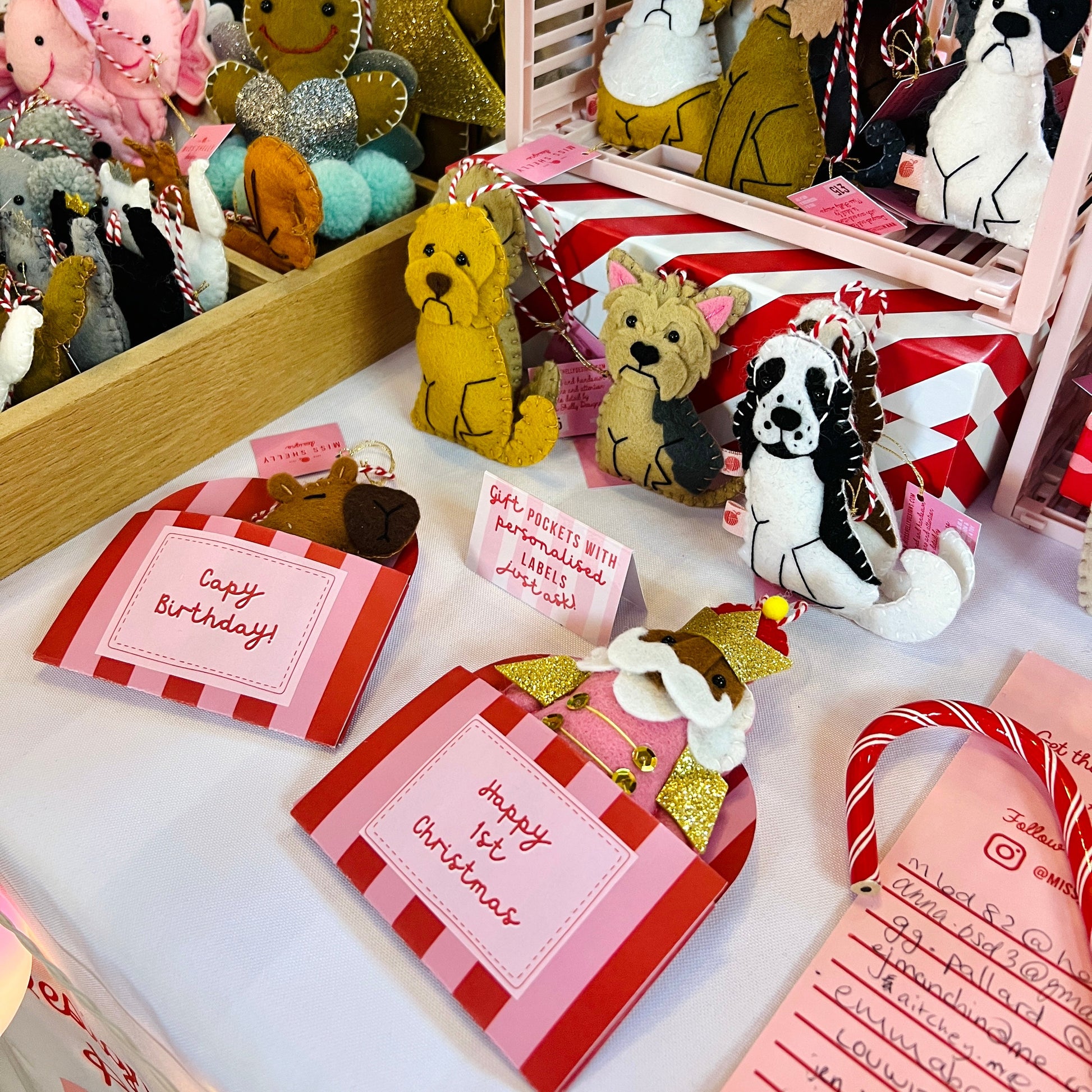 Red and pink personalised pocket boxes designed by Miss Shelly Designs for her felt Christmas ornaments