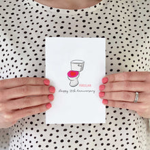Load image into Gallery viewer, A person holding a 18th anniversary card. On the card is a drawing of a toilet as it&#39;s a porcelain anniversary.