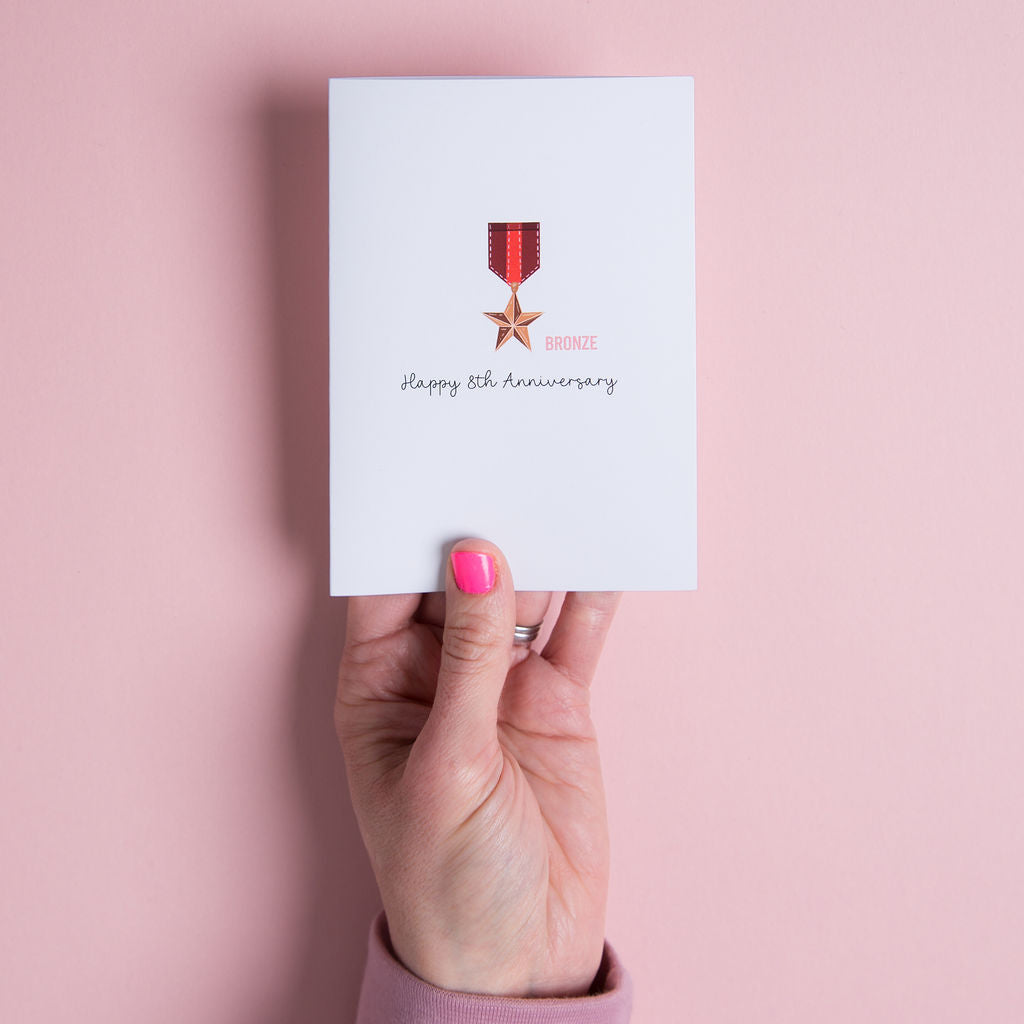 Bronze anniversary card 8th year medal illustration UK. Traditional gift for an 8th anniversary is bronze.