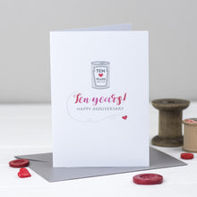 Load image into Gallery viewer, Ten year wedding anniversary card with tin can.