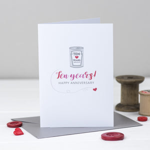 Ten year wedding anniversary card with tin can.
