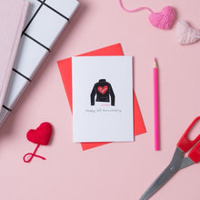 Load image into Gallery viewer, a card for a 3rd anniversary. The card is white with a picture of a leather jacket as the traditional gift for a 3rd anniversary is leather. The card sits on a red envelope.