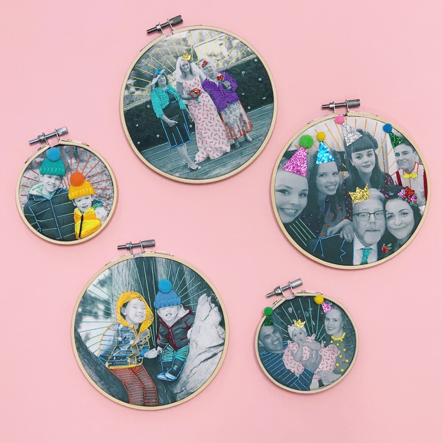 Personalised embroidered photo hoop gifts with colourful stitching and pom pom hats. Showing different sized embroidery hoops.
