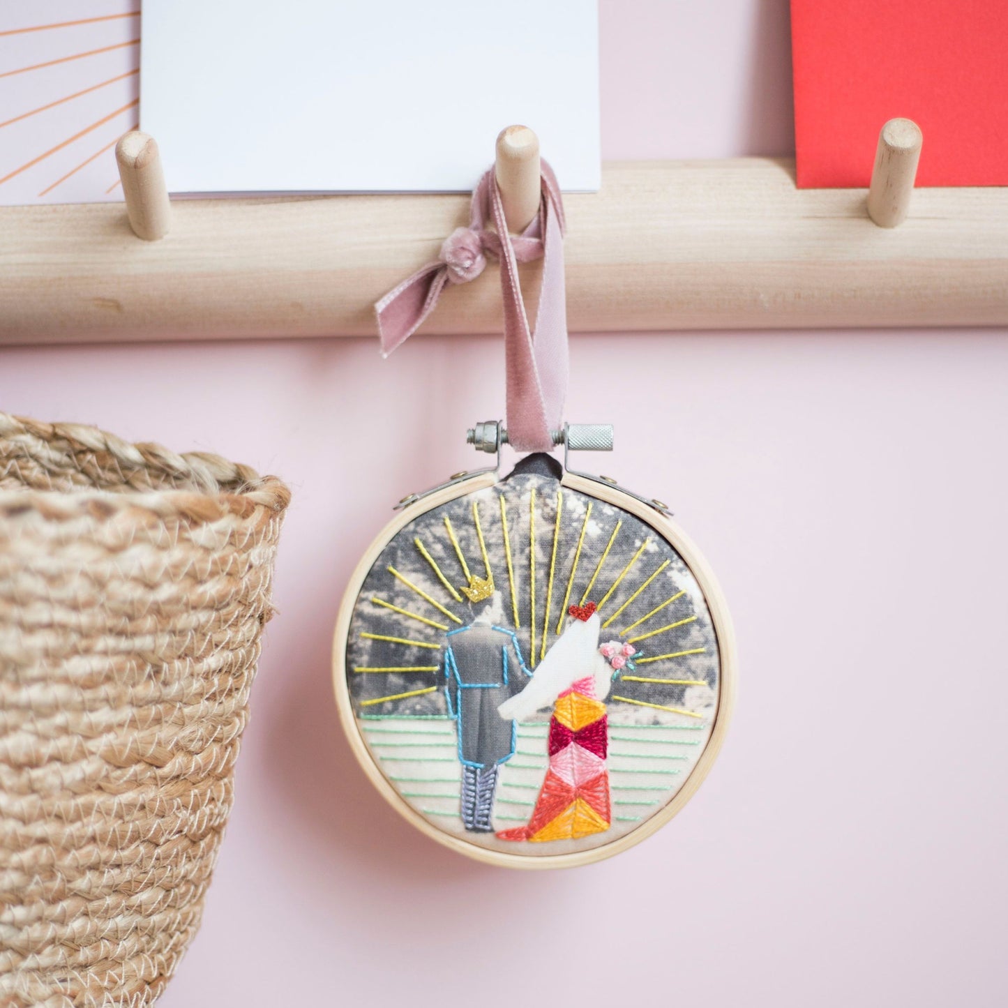Unique personalised photo hoop gift of a bride and groom. Colourful stitches have been added to highlight their special day.