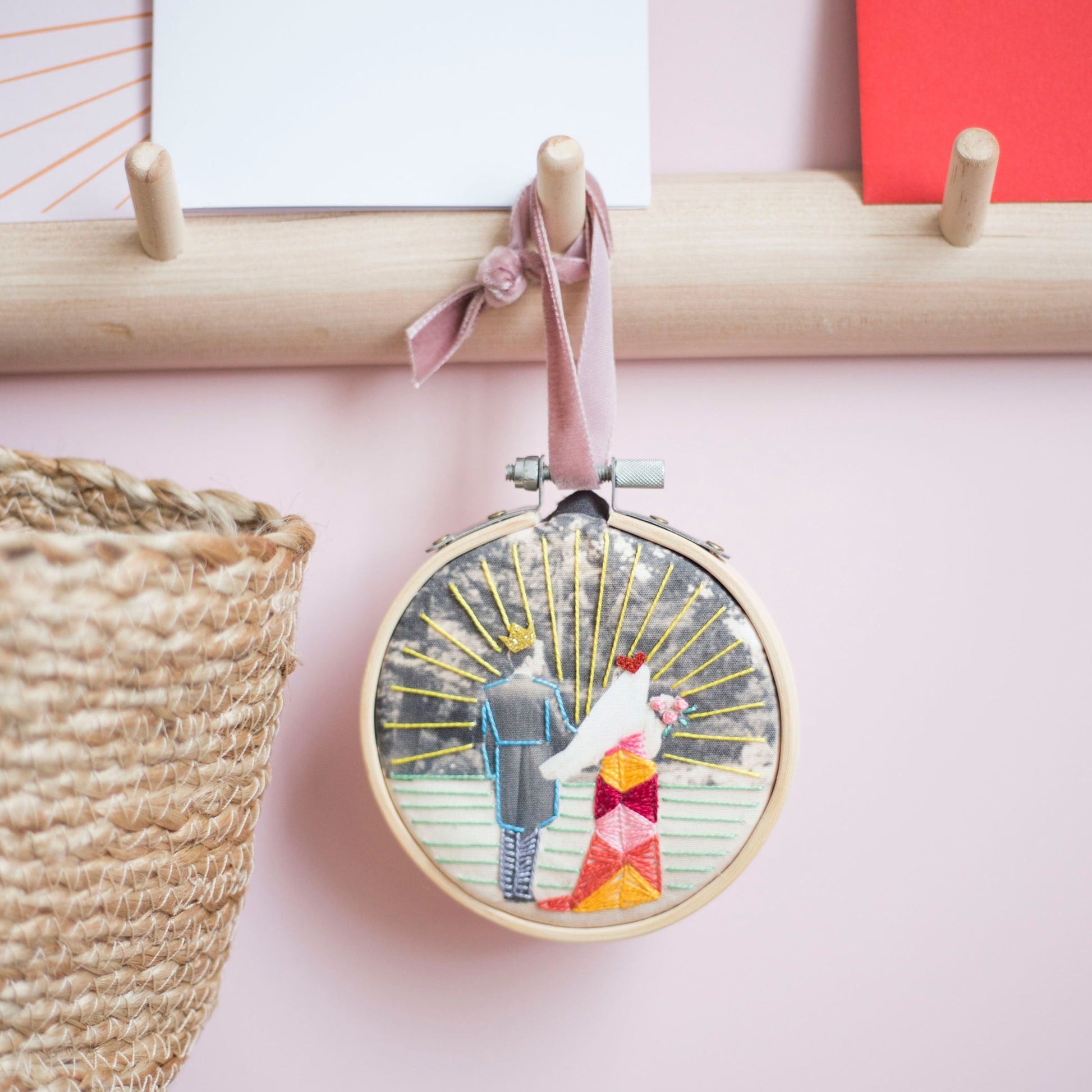 Unique personalised photo hoop gift of a bride and groom. Colourful stitches have been added to highlight their special day.